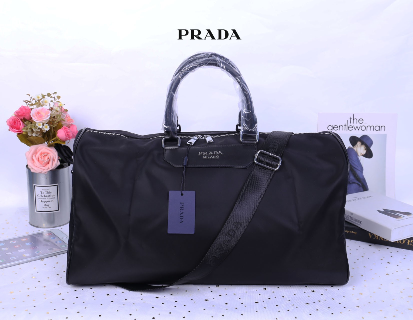 กระเป๋าเดินทางใบใหญ่เรียบหรูดูดี แบรนด์เนมพราด้าสีดำอะไหล่เงิน PRADA NERO NYLON TRAVEL BAG