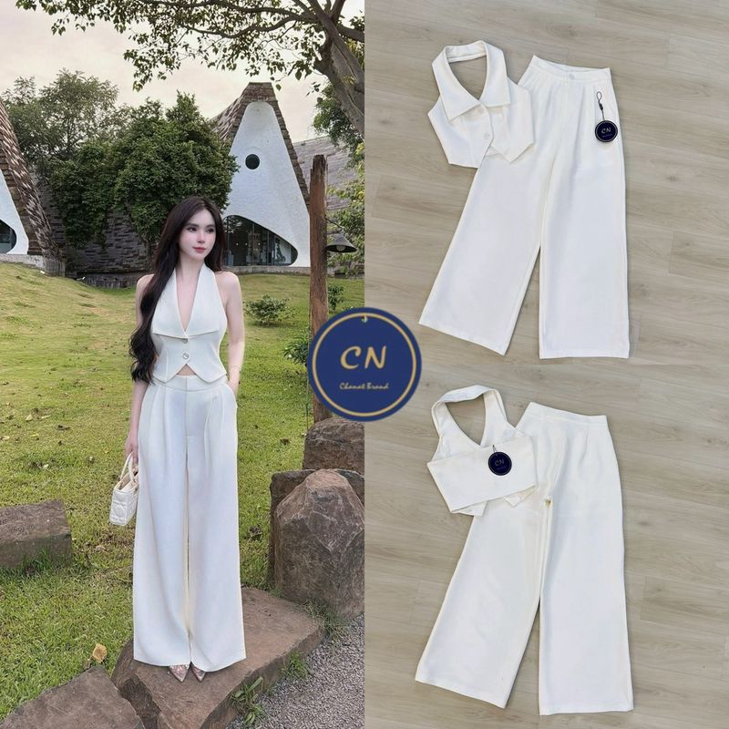 Set 2 ชิ้นสีขาวทั้งชุด ตัวเสื้อคล้องคอ ทรงเข้ารูปมีกระดุมหน้าใช้งานได้จริง ด้านหลังเว้าทรงสวย มาพร้อมกับกางเกงขายาวทรงกระบอกใหญ่ดีเทลจับจับด้านหน้าให้ดูมีมิติ กระดุมและซิปหน้า มีกระเป๋า2ข้าง
