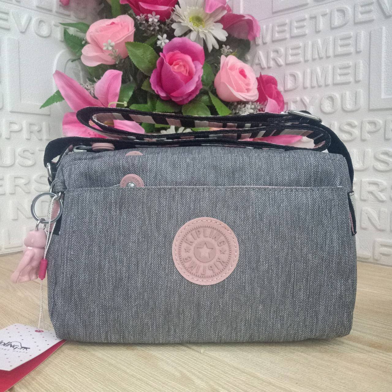 กระเป๋าสะพายแบรนด์เนมคิปลิ้งค์สีเทาชมพู KIPLING Mini Crossbodybag