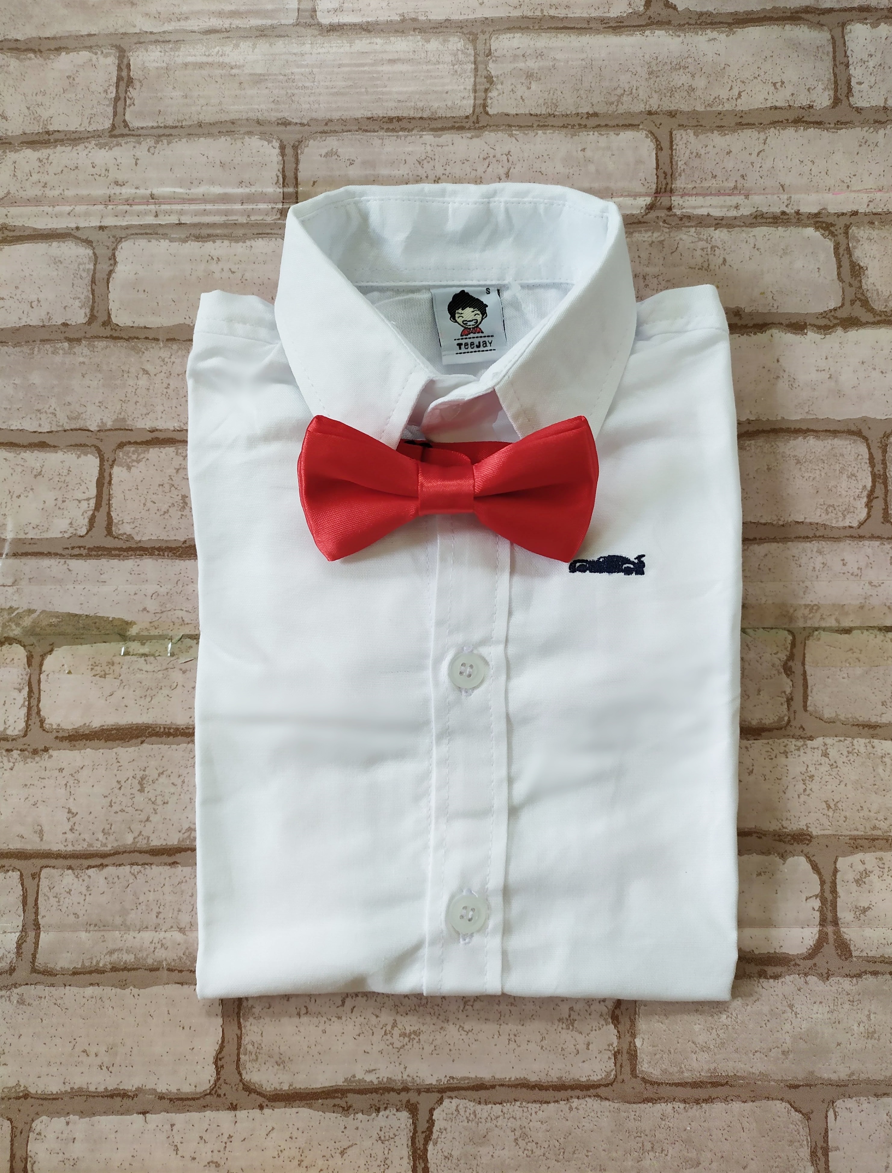 B+B36012 เสื้อเชิ้ตเด็ก แขนยาวสีขาว พร้อมโบว์สีแดง