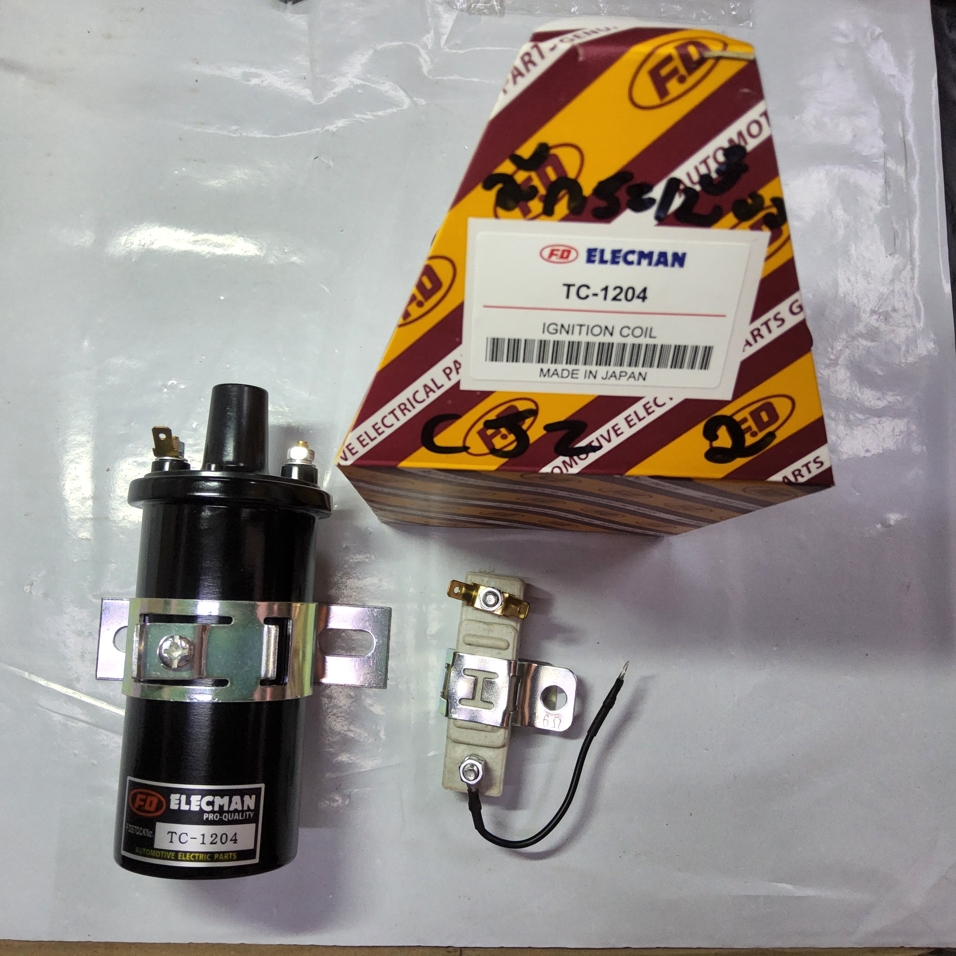 คอยจุดระเบิด FD TC-1204 เกรด ญี่ปุ่น ( เทียบเท่า HITACHI C6R 800S ) พร้อมกระเบื้องตัดไฟ มีรับประกัน รถยนต์ทั่วไป 12V [ T CNE Y ]