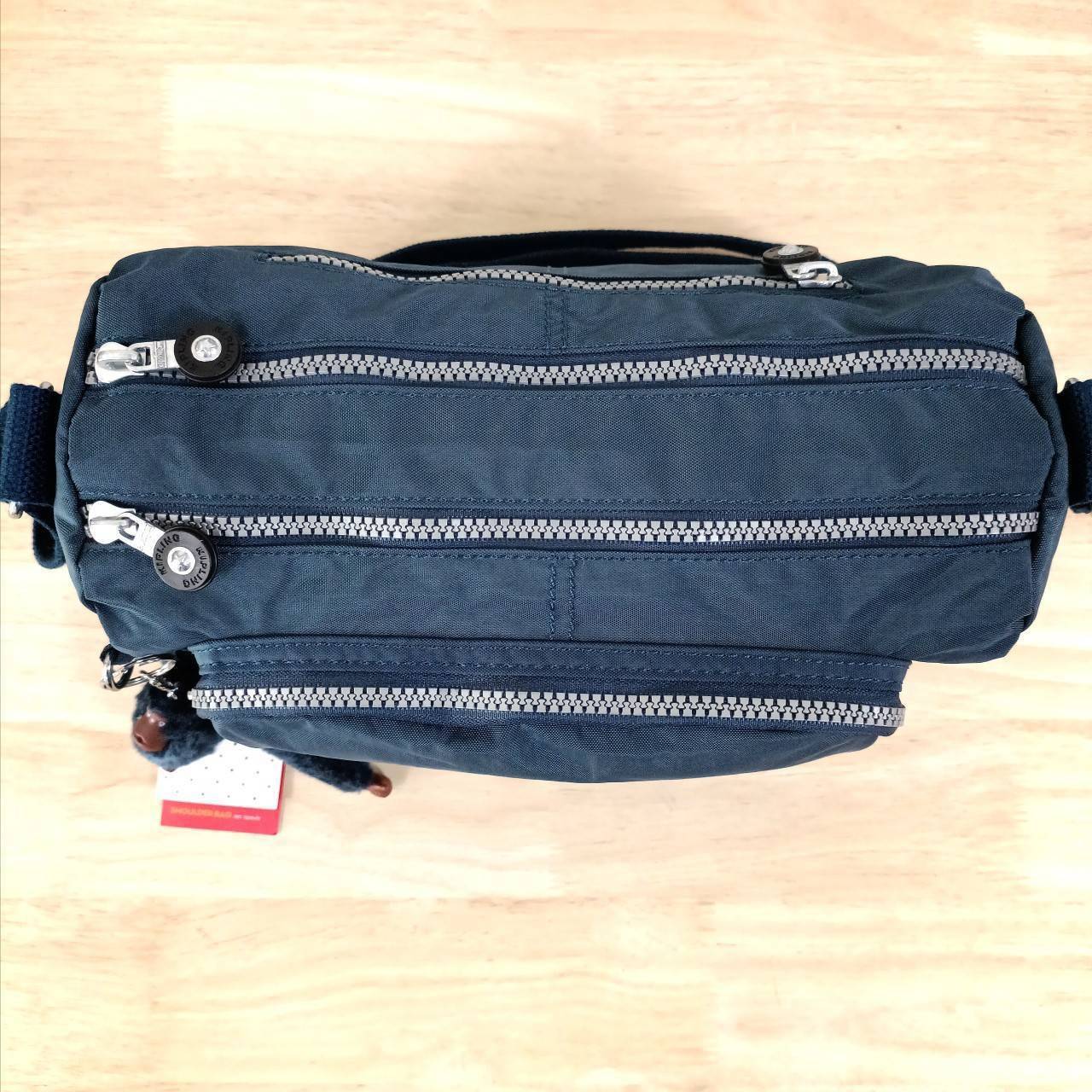 กระเป๋าสะพายคิปลิงค์จุของได้เยอะใช้ได้ทั้งหญิงชาย KIPLING RETH CROSSBODY BAG