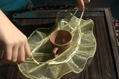 ถุงผ้าไหมสีทองทรงกลม 4 ใบ