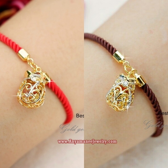 ด้ายแดงมงคลห้อยจี้ถุงทองนพเก้า ปลุกเสกแล้วนำเข้าฮ่องกง มี2สี