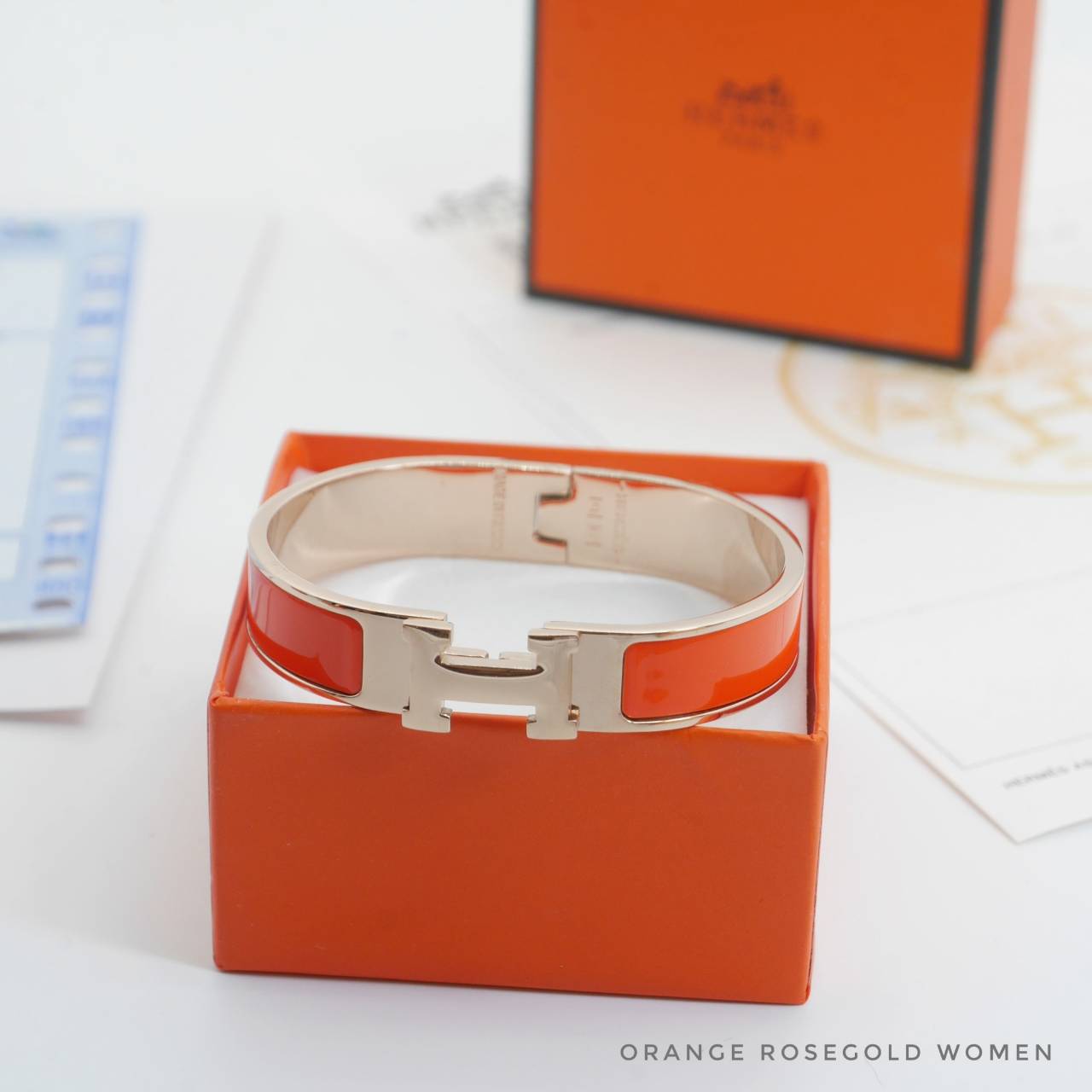 กำไลแบรนด์เนมแอเมส Hermes Bracelet - สีส้มขอบทอง