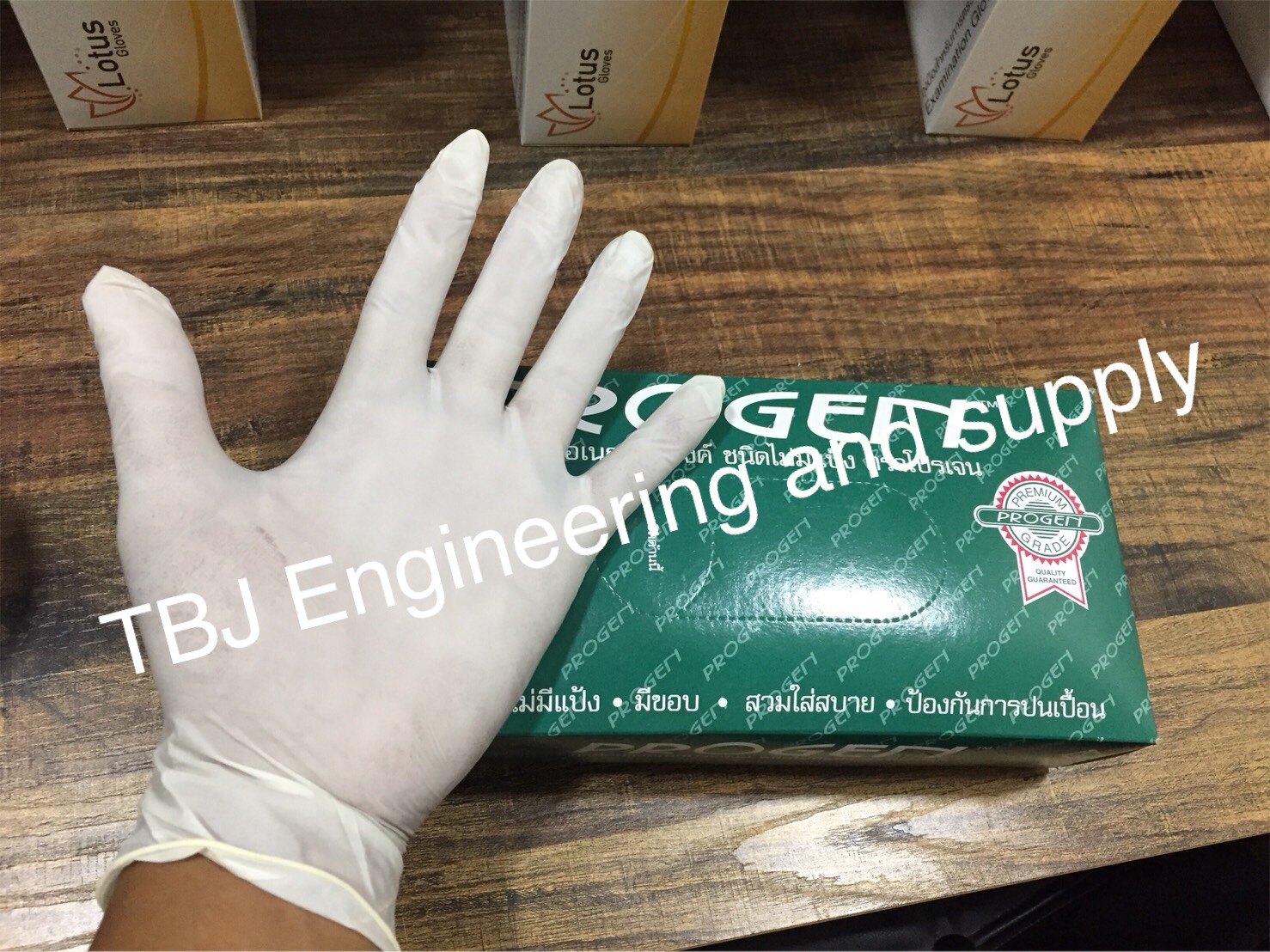 ถุงมือแพทย์ ถุงมือยาง แบบมีแป้ง Brand : Progen