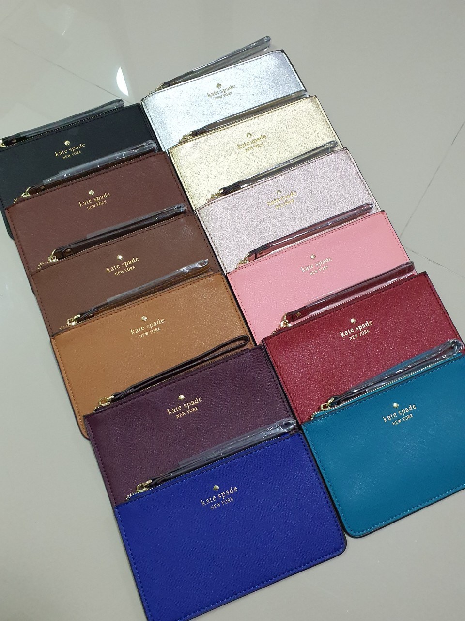กระเป๋าคล้องมือไฮโซเรียบหรูดูแพงแบรนด์เนมเคทเสปดสีดำ KATE SPADE NEW YORK CLUTH BAG